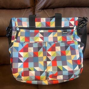 Skip Hop diaper bag. Like new used a few times.